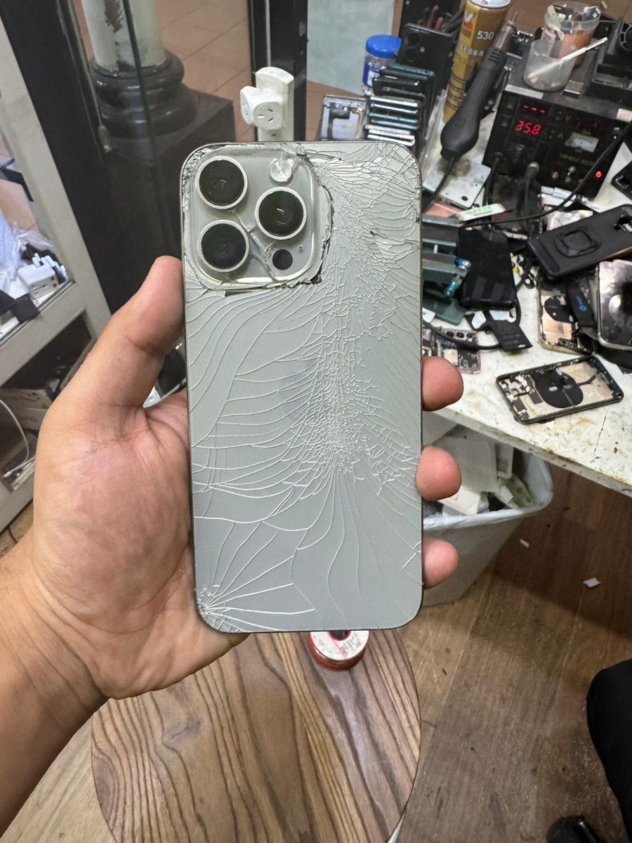 Phone before repair - cracked screen